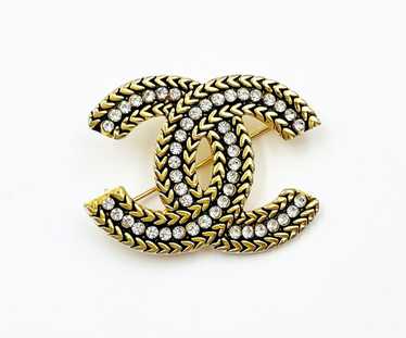 Authentic vintage Chanel pin brooch gold CC logo double C – Luxury Market  Consignment Boutique