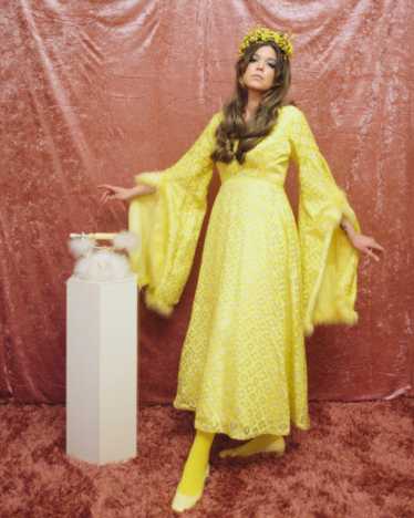 1970s yellow brocade marabou bell sleeve gown