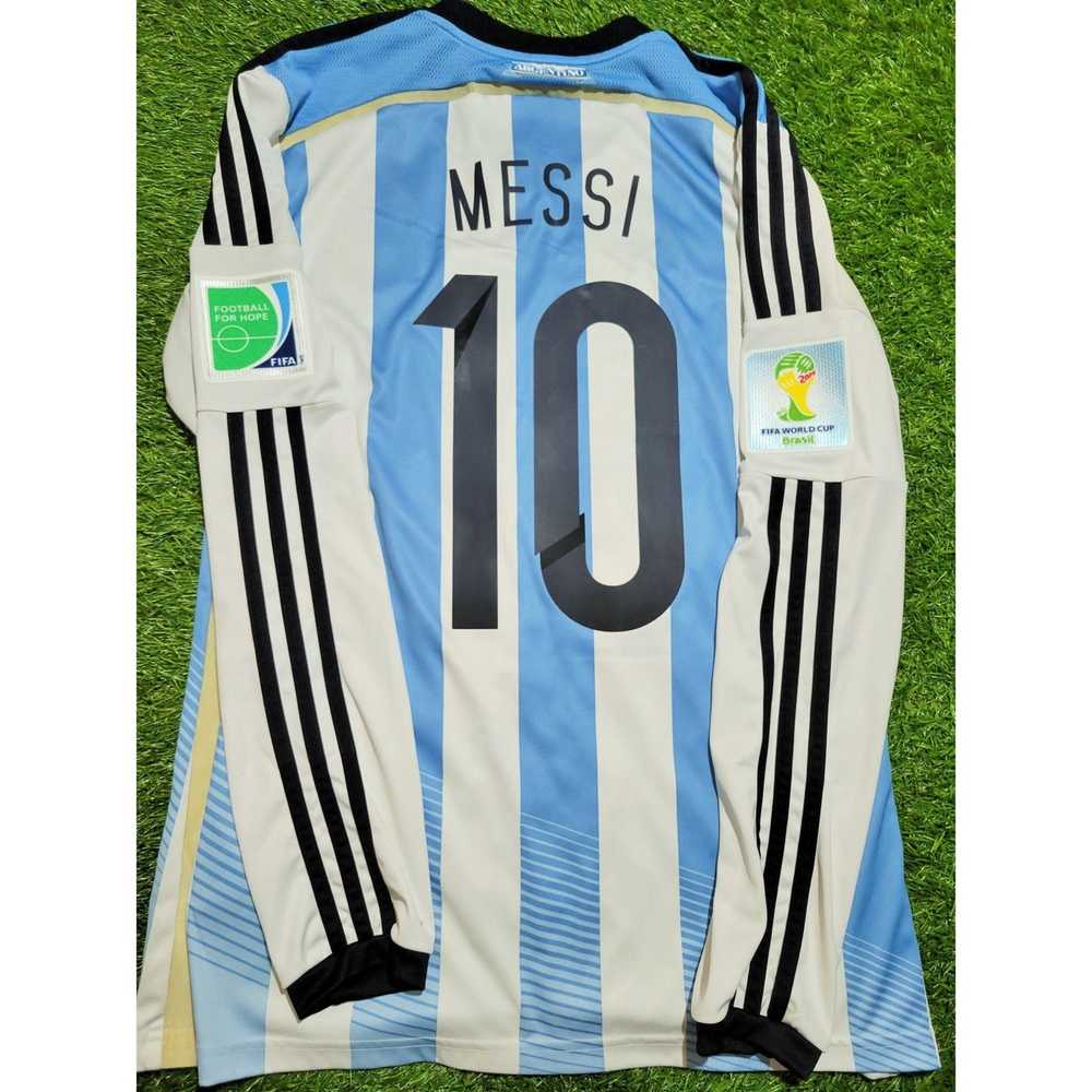 Argentina soccer jersey. Lionel Messi shirt. Number 10. light blue and  white. AFA logo. Argentine Football Association. Adidas. Shield. Soccer  player. Stock Photo