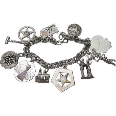 Vintage Sterling Silver Charm Bracelet with 11 Charms .90 Troy Ounces