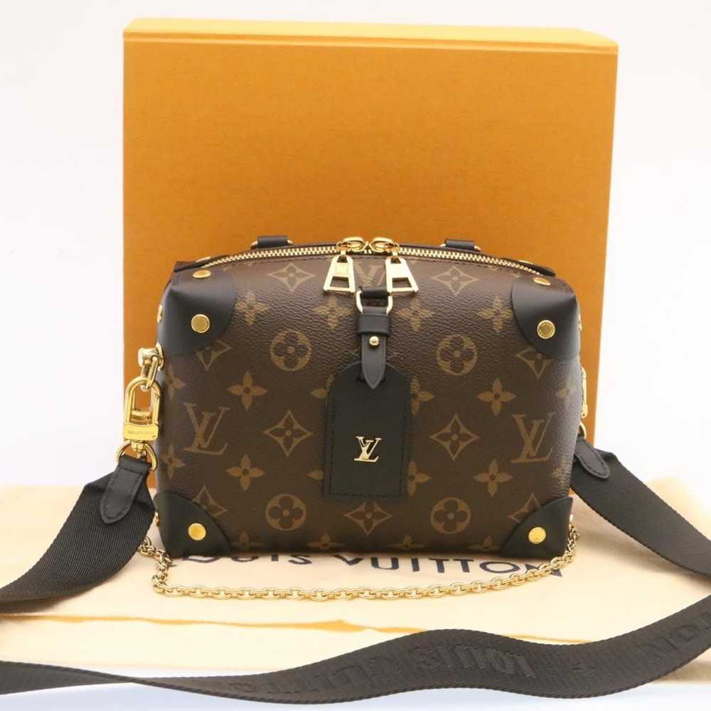 Louis Vuitton logo satchel, with leather handles and leather zipper pull.  12x9. And Antik Kraft logo shoulder bag, black, 11x12. Handle drop is  21. - Bunting Online Auctions