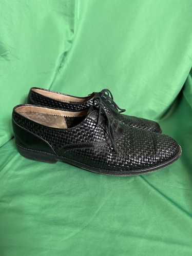 A. Testoni Woven leather wicker-style Oxford shoes