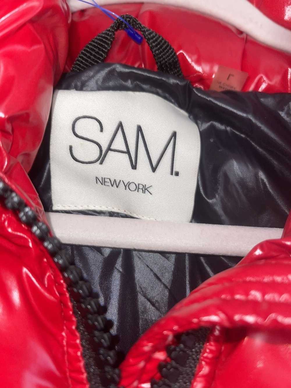 SAM. Sam’s red vest - image 2