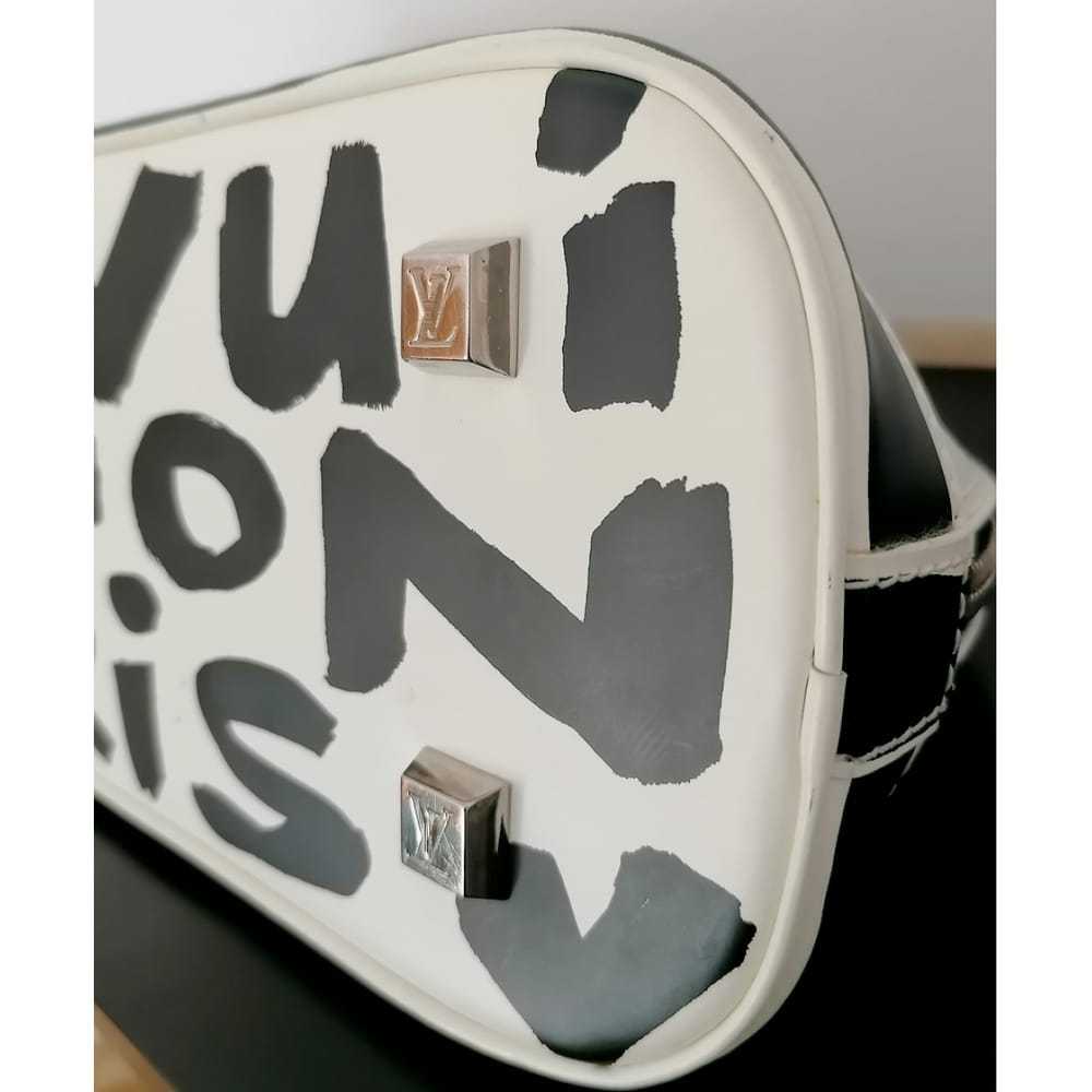 Louis Vuitton Alma Graffiti leather handbag - image 11