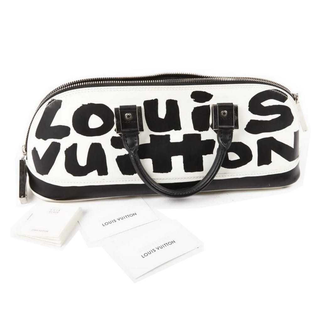 Louis Vuitton Alma Graffiti leather handbag - image 9
