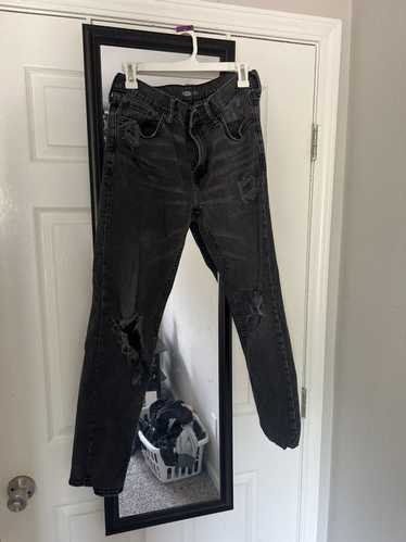 slim fit ripped black rockstar jeans