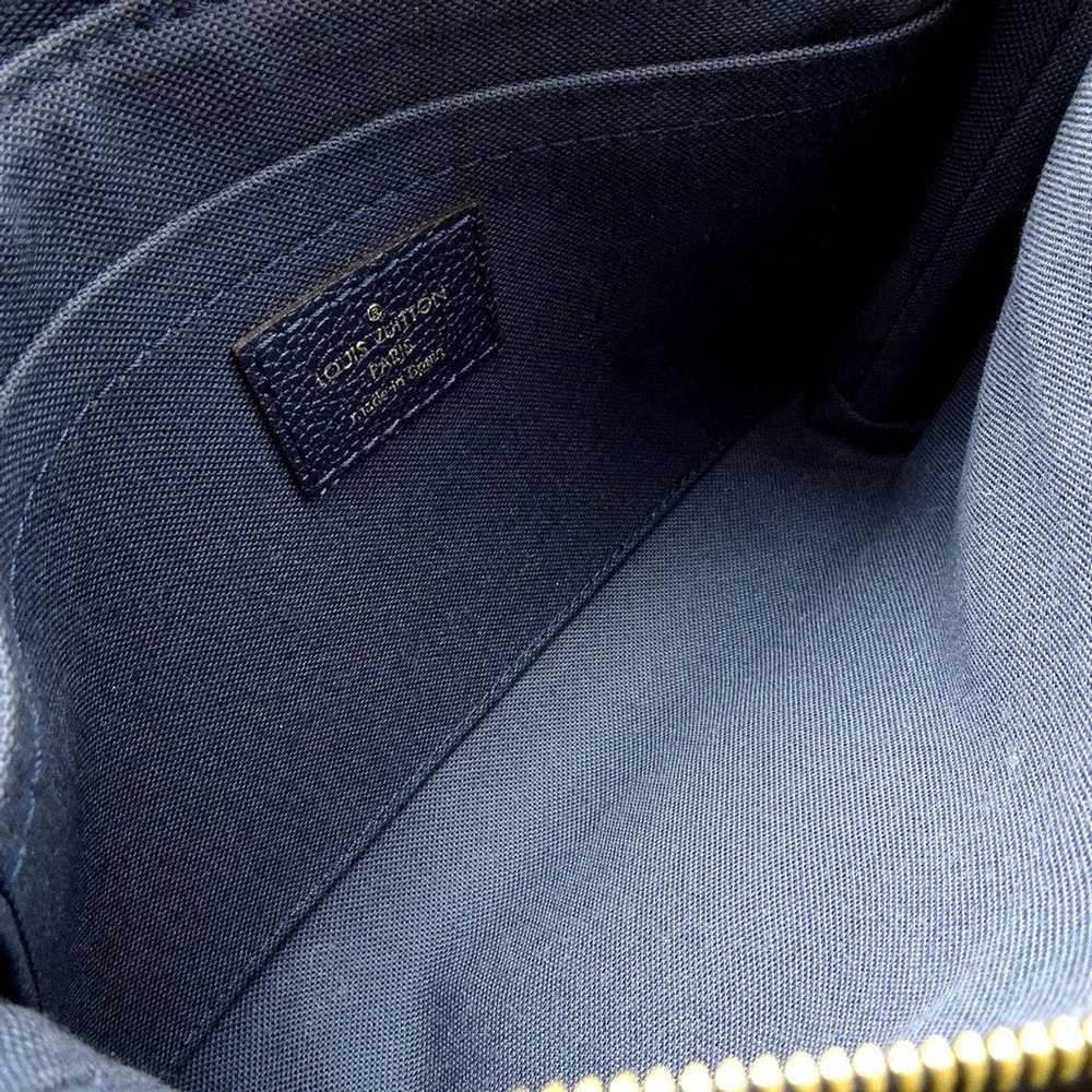 Louis Vuitton® 3d Monogram Lightweight Parka Blue Grey. Size 38 in
