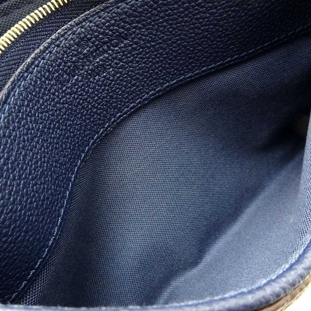 Louis Vuitton Brown Monogram Utility Front Bag Black Leather Cloth  Pony-style calfskin ref.954636 - Joli Closet