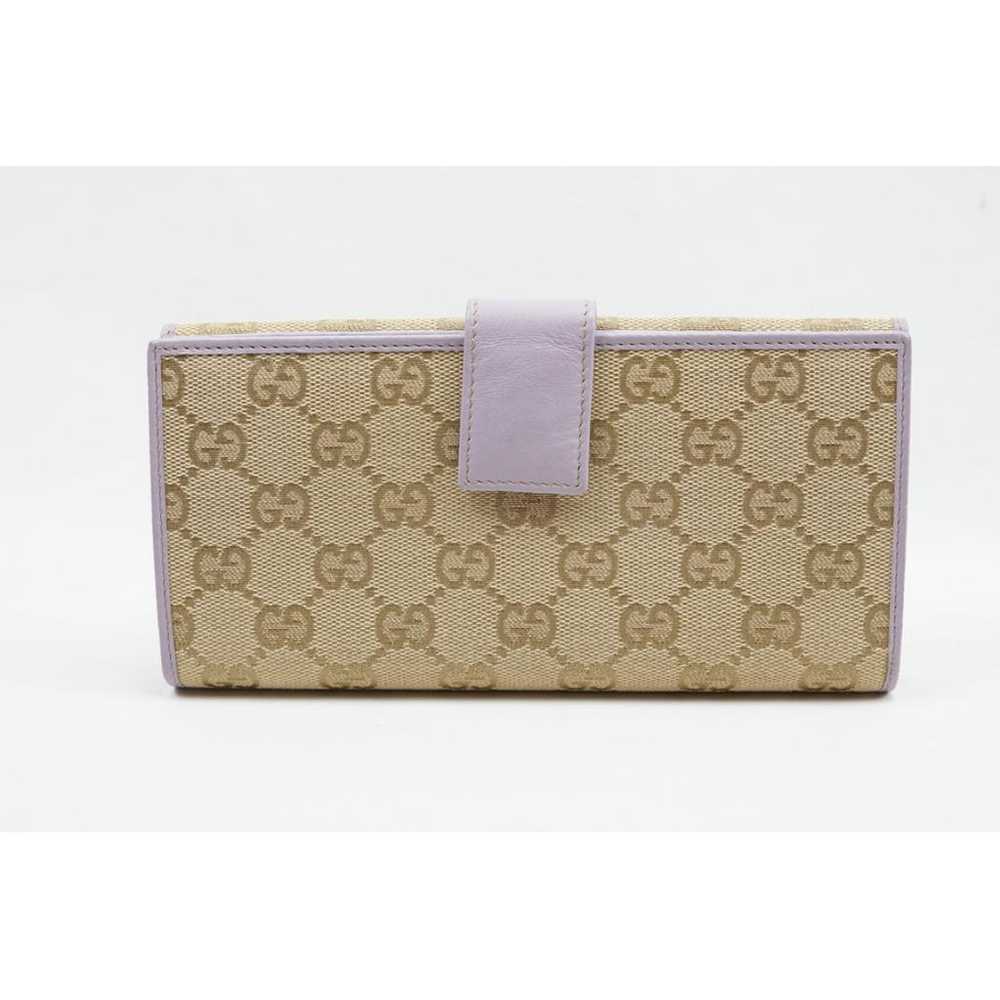 Gucci Continental cloth wallet - image 7