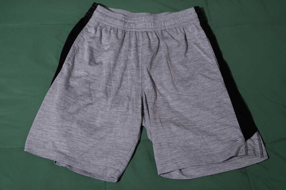 Reebok Gray workout shorts size medium - image 1