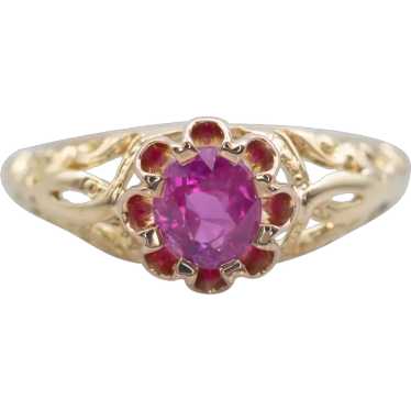 Scrolling Pink Sapphire Solitaire Ring