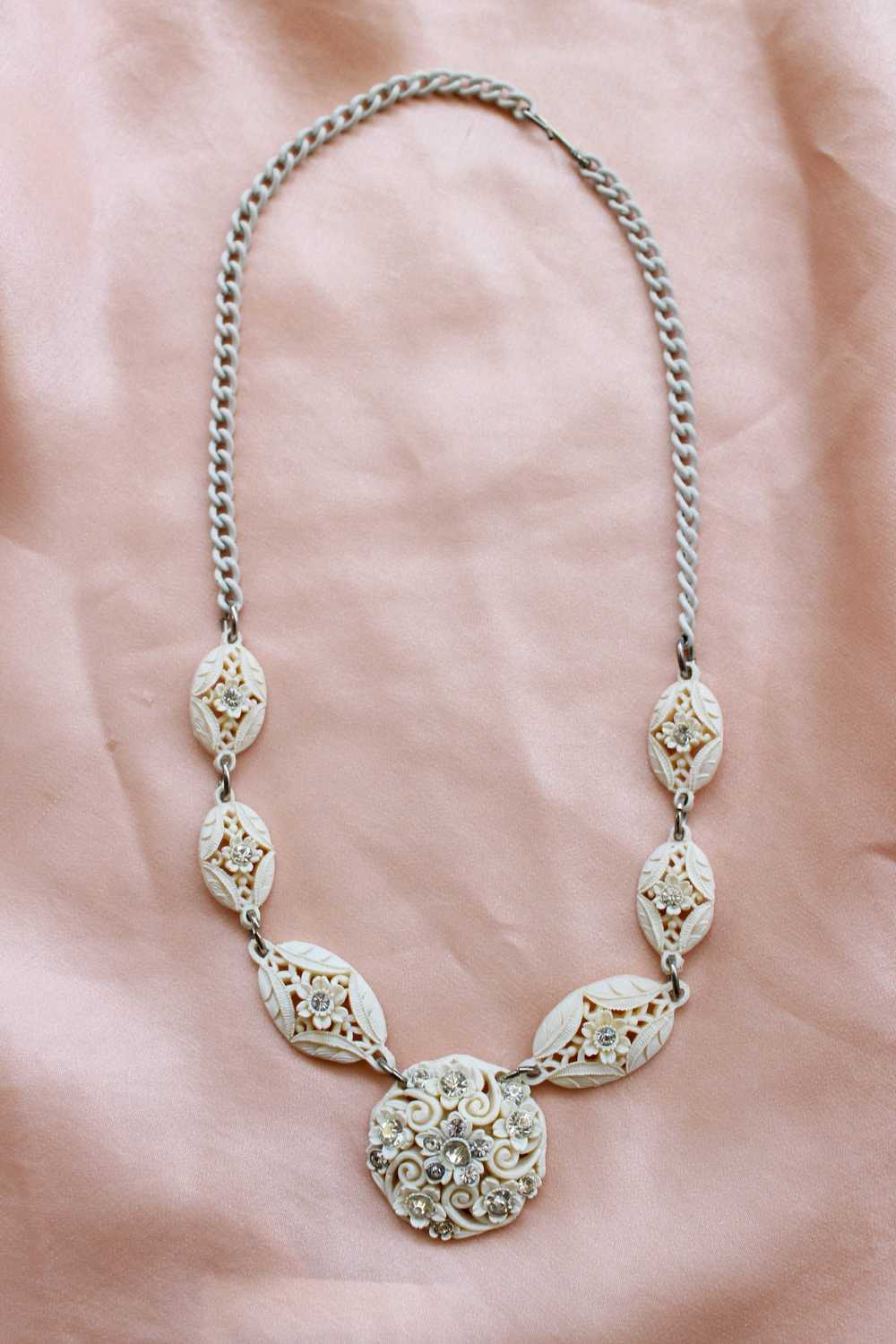 1950s White Carved Celluloid Rhinestone Necklace - image 1