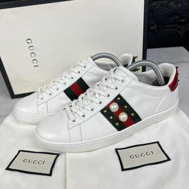 Gucci Women's Ace studded pearl and metal spike on gold light leather  sneaker