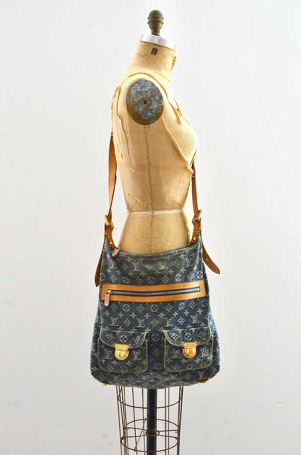 vintage Louis Vuitton shoulder bag with magnetic flap pockets, lace-up  shirt with high waist denim shorts - Meagan's Moda