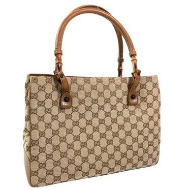 Gucci GG Canvas Eclipse Crossbody Bag (SHG-29812) – LuxeDH
