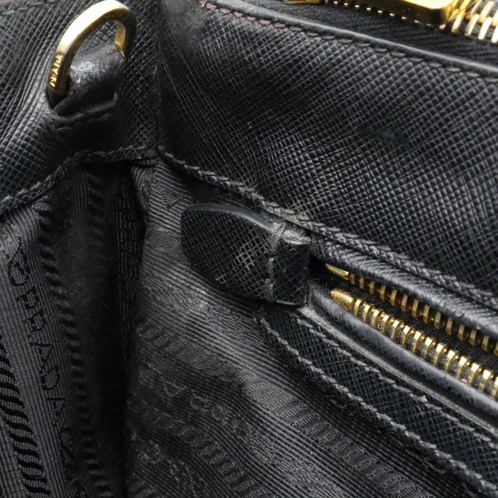 Shop PRADA Saffiano leather Prada Identity shoulder bag (1BD200 2EDV F0002)  by momochani