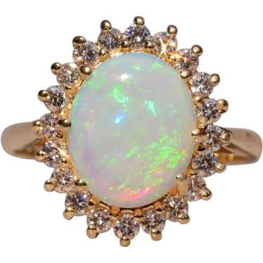 Ladies 14K Australian Opal and Diamond Halo Ring