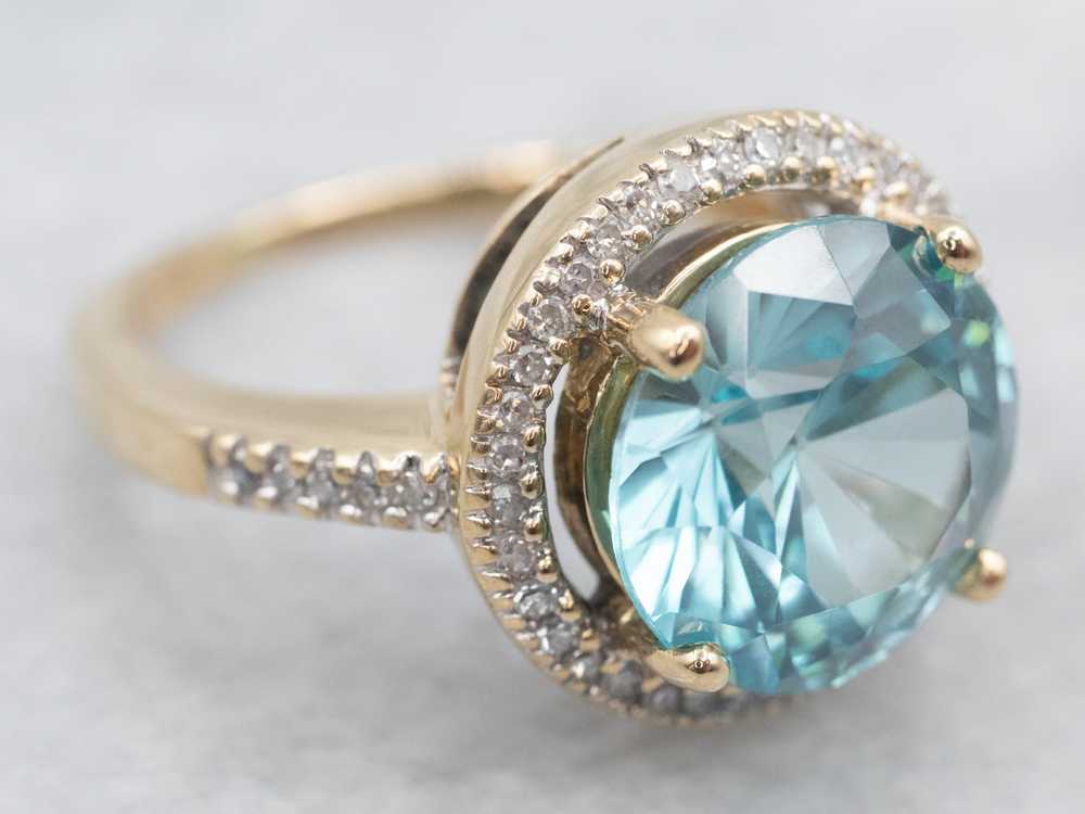 Stunning Blue Zircon and Diamond Halo Ring - image 2
