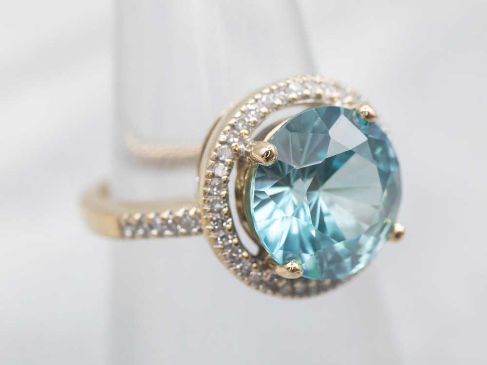 Stunning Blue Zircon and Diamond Halo Ring - image 4