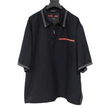 トップス 00s prada sports rubber logo polo sullen Prada Black Rubber Logo Short Sleeved Polo - Double Extra