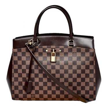 Louis Vuitton Rivoli cloth handbag