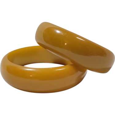 Early butterscotch color plastic bangles