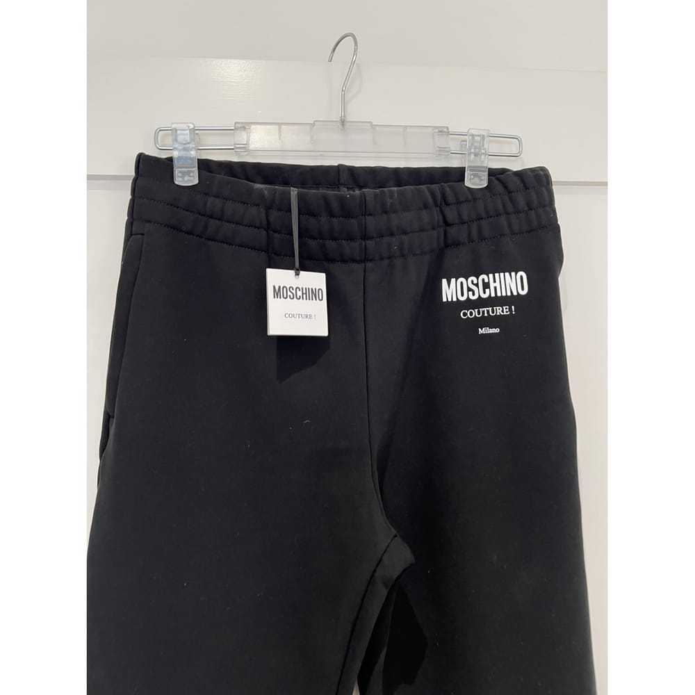 パンツ MOSCHINO Crepe pants Black Moschino Cheap & Chic Black Crepe Slim Leg Pants with Brass
