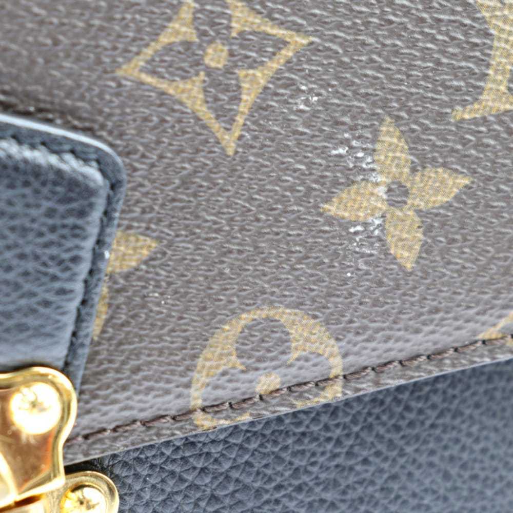 Louis Vuitton Victoire leather handbag - image 8