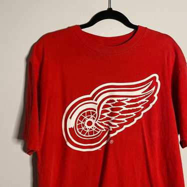 Mid-1950's Detroit Red Wings White Cardigan Sweater. Hockey, Lot #82128, Heritage Auctions
