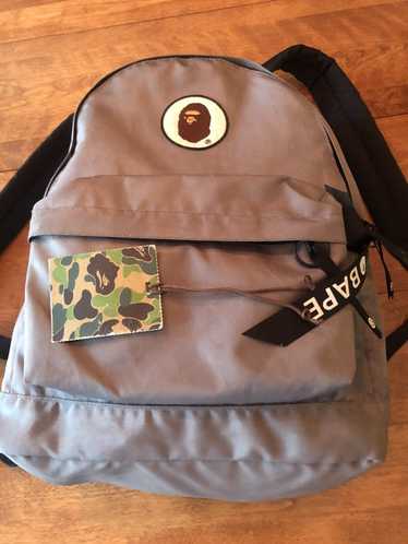 The Cellar Boutique - •Brand New Bape Backpack. $130 •Bape Blue Camo Face  Tee. Size Medium. $85 Available In Store & Online ‼️