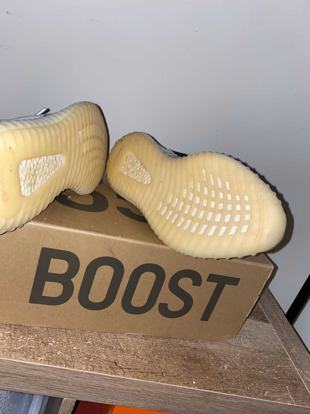SBD - Pharrell adidas Swim C Kamizelka Cream Q46454 Release Date - The  Wests at the New York launch of Kanye s new shoe with Adidas