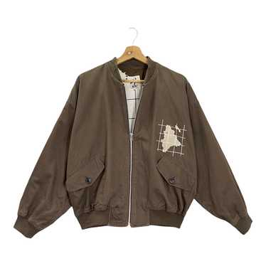Grailed on Instagram: “@akikazumatsuno wears a vintage varsity jacket,  Issey Miyake cargo pants and Travi…