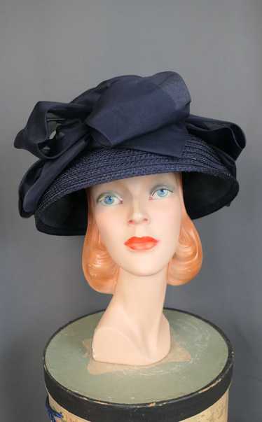 Vintage Navy Hat with Wide Brim and Dramatic Organ