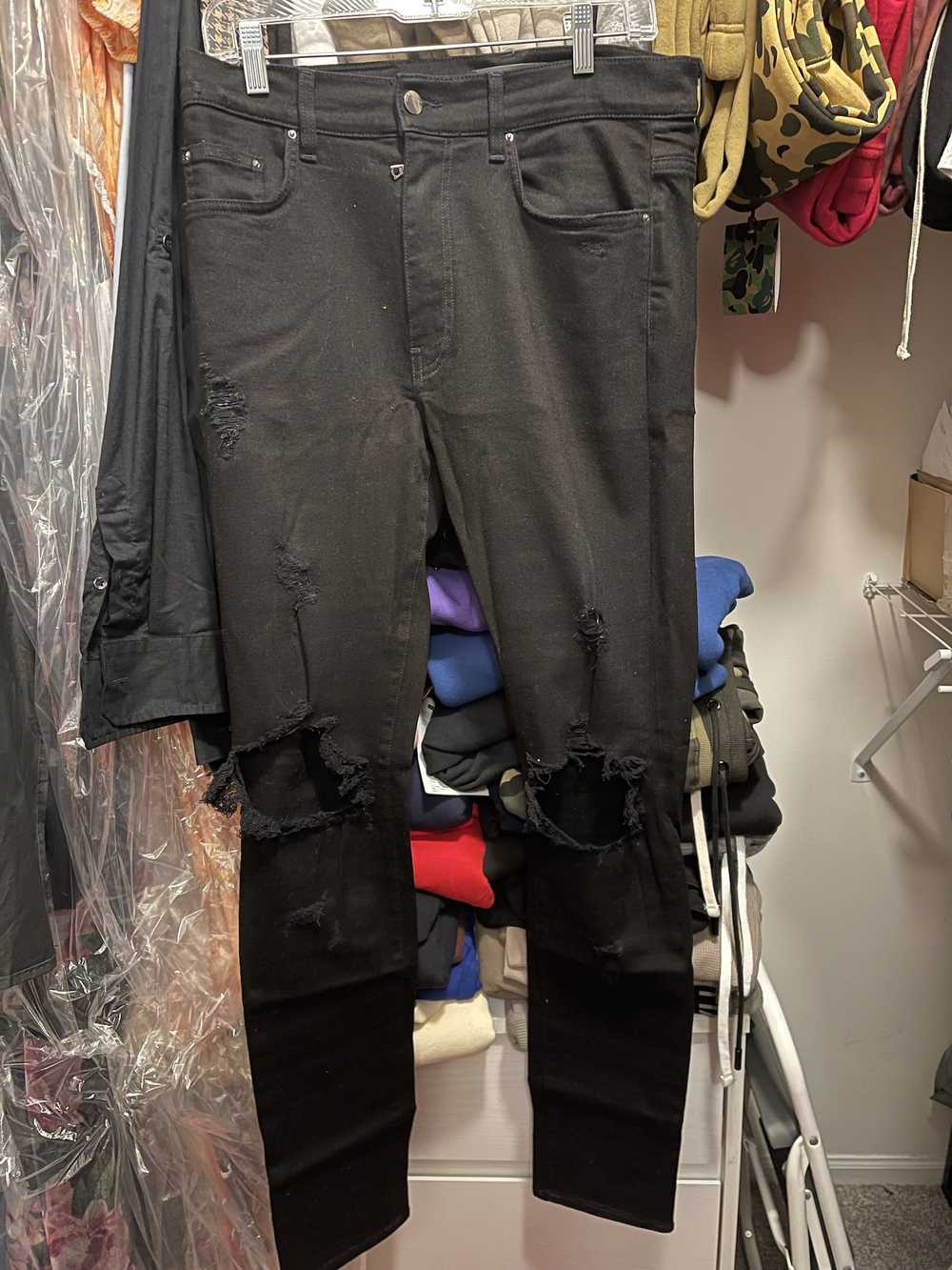 Amiri black best sale thrasher jeans