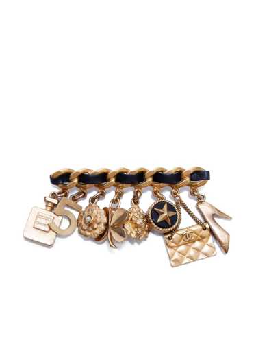 CHANEL Pre-Owned 1994 Icon charm brooch - Gold