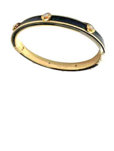 Beautiful Henri Bendel iconic black bangle with go