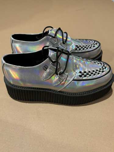 Tuk holographic store creepers