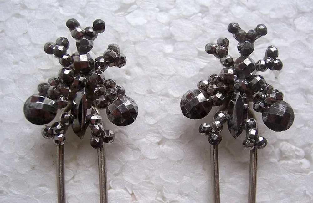 Set of four late Victorian cut steel hair pins th… - image 10