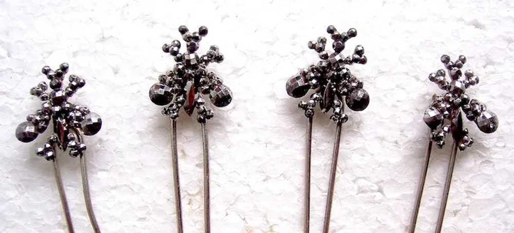 Set of four late Victorian cut steel hair pins th… - image 2
