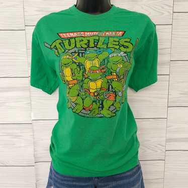 https://img.gem.app/883914418/1t/1700818424/teenage-mutant-ninja-turtles-vintage-looking-shirt.jpg