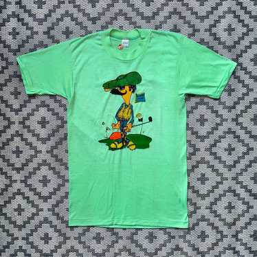 https://img.gem.app/884081647/1t/1700839399/vintage-70s-golf-cartoon-graphic-t-shirt.jpg