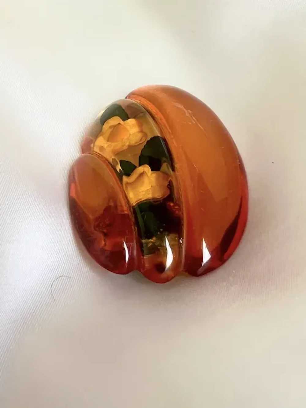 Bakelite Dress Clip Reverse Carved Applejuice Art… - image 4