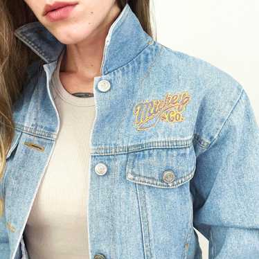 https://img.gem.app/888801033/1t/1701271862/vintage-disney-mickey-and-co-denim-jacket.jpg