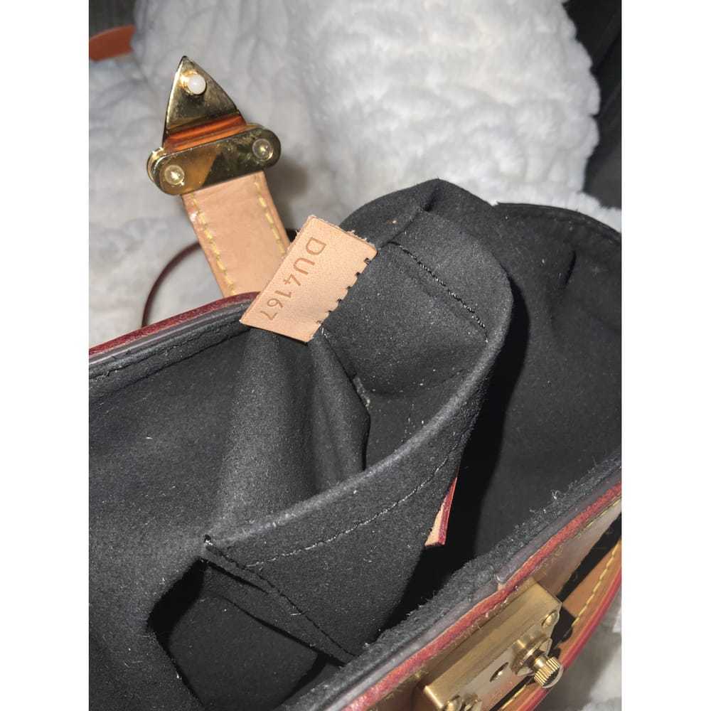 Louis Vuitton Duffle leather handbag - image 9
