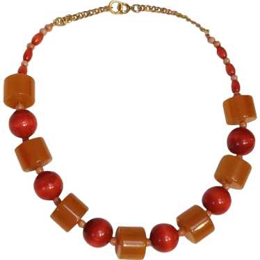 Bakelite marbled caramel and red wood bead necklac