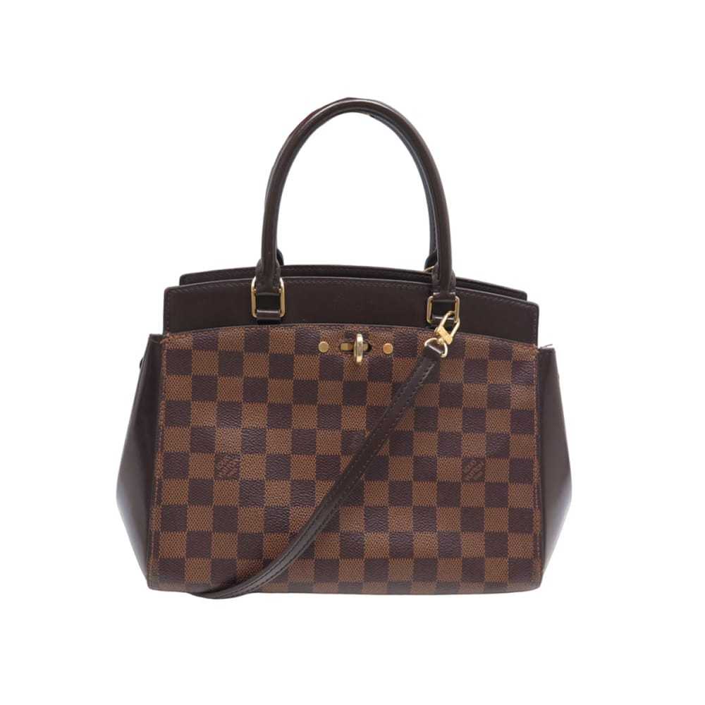 Louis Vuitton Rivoli cloth handbag - image 1