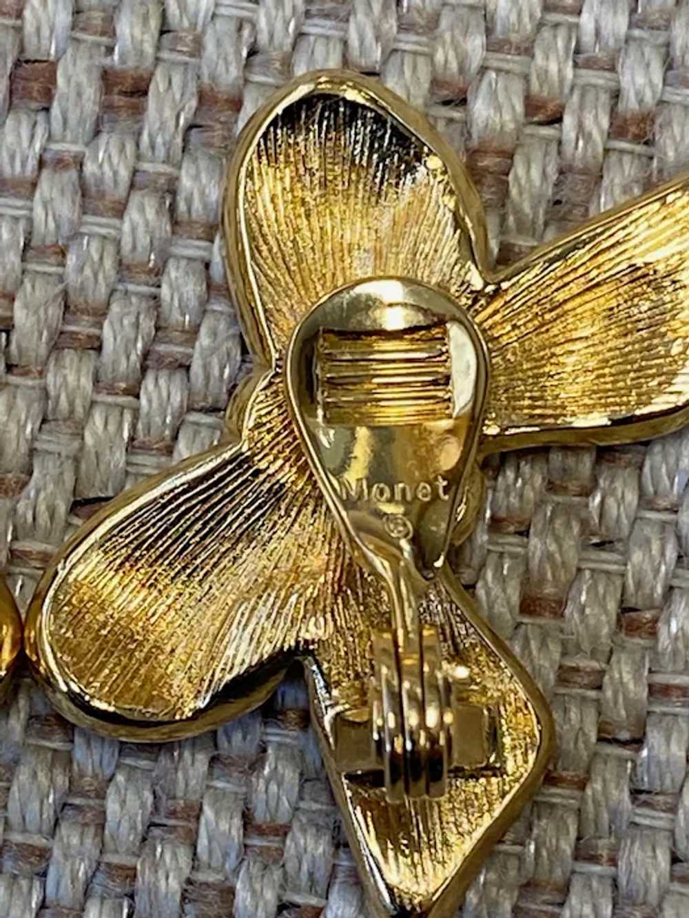Vintage Monet Gold Tone Crystal Studded Bow Clip … - image 3