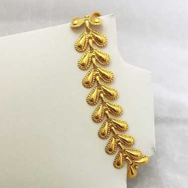 Bracelet Vintage 90s Avon Floral Gold Tone Leaf B… - image 1