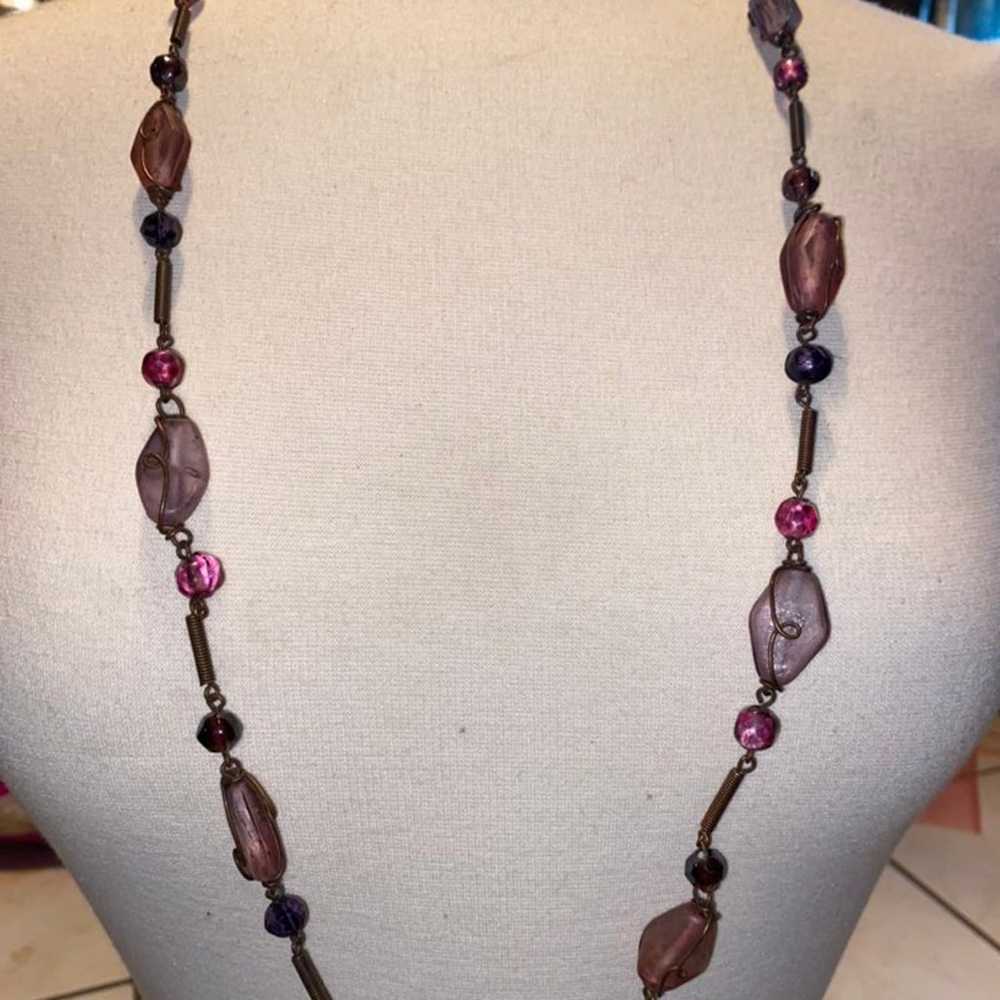 Purple hue stones on this long vintage necklace - image 1