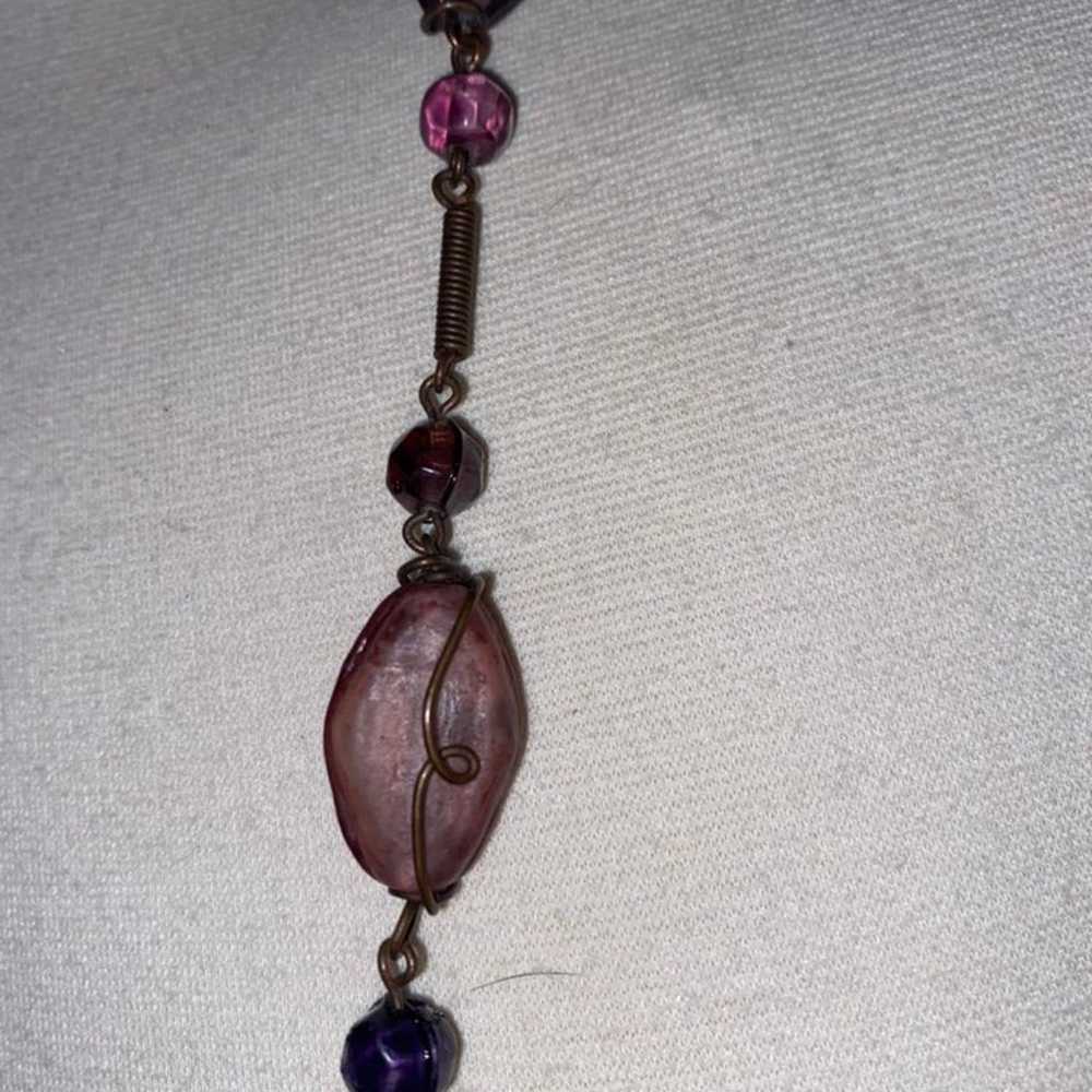 Purple hue stones on this long vintage necklace - image 2